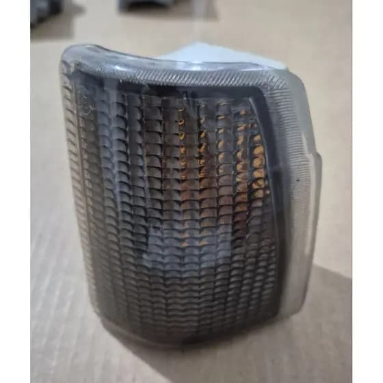 Lanterna dianteira pisca fumê Vw Gol 87/90 lado motorista.