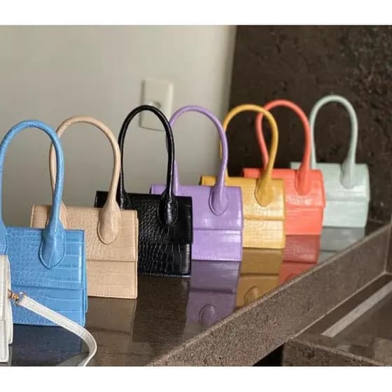 Bolsa transversal com alça de mão e ombro couro sintético