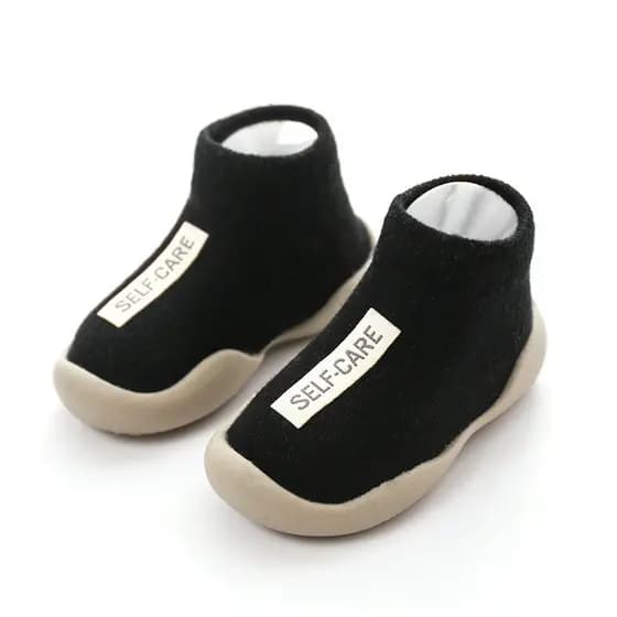 Sapatos De Bebê Primeiros Andadores Novo Unissex Primeiro Andador Crianças Sola De Borracha Macia Sapato Preto Botas De Malha Antiderrapante