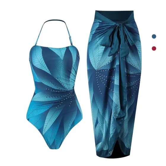 Maiô feminino de uma peça azul com estampa vintage, decote halter e saia de praia.