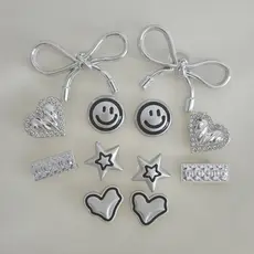 12 Pçs/set Prata Rosto Sorridente Série Sheo Acessórios Arco Nó Em Forma De Coração Sapato Fivela Encantos Para Mulheres
