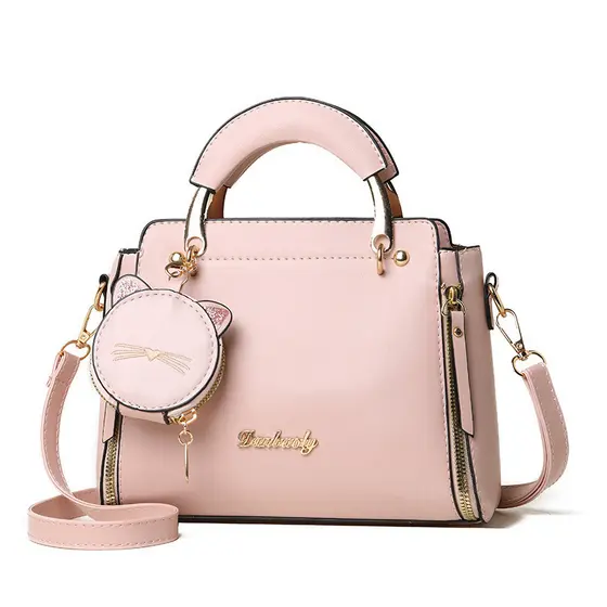 Esta bolsa feminina com padrão de gato pode ser usada como bolsa de ombro, bolsa transversal ou de mão.