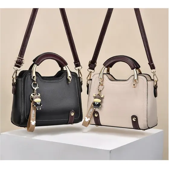 Bolsa feminina elegante, moderna, simples e sofisticada, adequada para uso no ombro ou transversal.