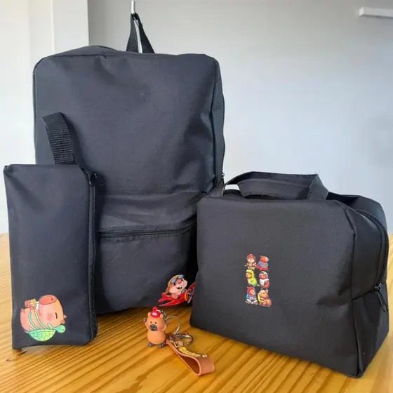 Kit Mochila Menina e Menino Escolar Infantil Bolsa Lancheira Estojo Estampas Capivara Chaveiro
