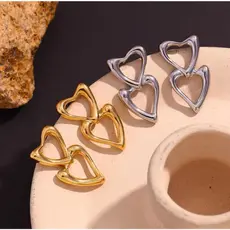 Brincos Femininos de Coração Vazado em Metal Irregular – Design Moderno e Elegante