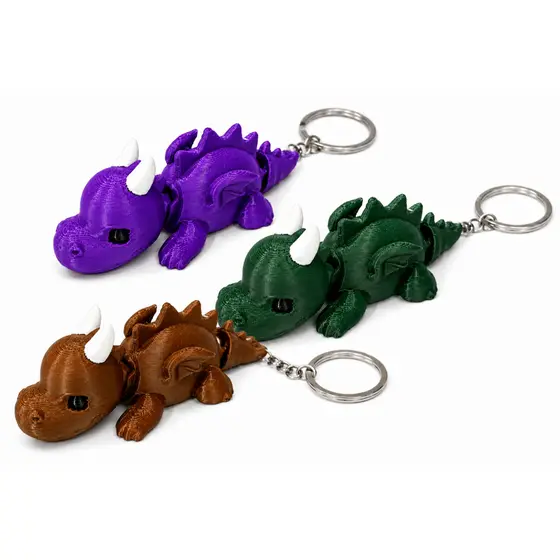 Chaveiro Dinossauro Articulado 3D Flexível – Fidget Toy  Decorativo