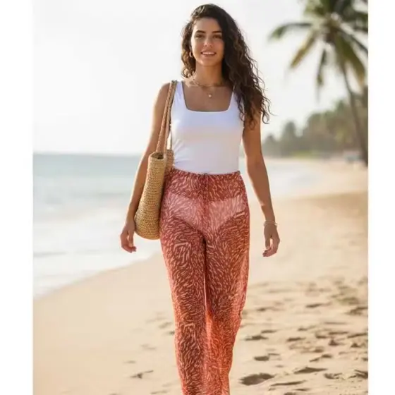 CALCA/SAIDA DE PRAIA EM TULE TRANSPARENTE