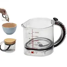 Copo medidor multifuncional, equipado com uma base de vedação ajustável estilo raspador quatro em um, design portátil.