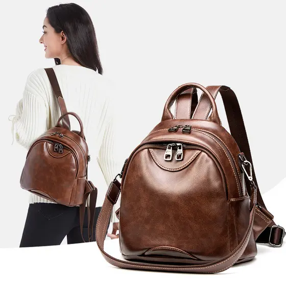 Mochila WAIEBFAF feminina estilo retrô britânico mochila de couro macio