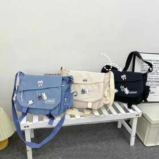 🎁Bolsa de Ombro Unissex de Grande Capacidade Estilo Coreano Bolsa Transversal de Nylon Retro e Elegante