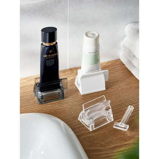 Pequeno limpador Facial Vertical espremendo dispositivo de espremer pasta de dente com manivela manual deixe garrafa de