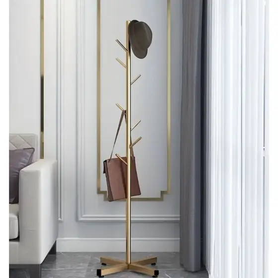 cabideiro de metal dourado