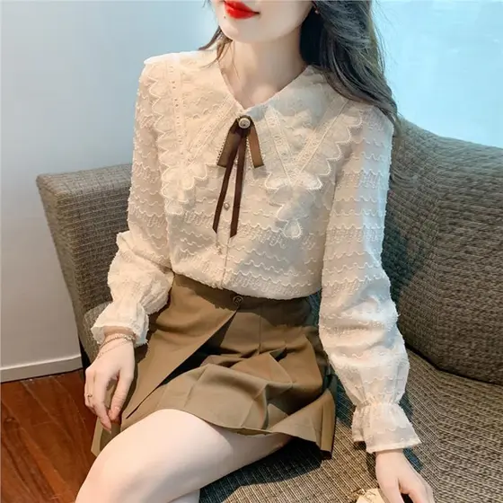 Camisa de gola de boneca de inverno feminina 2025 novo estilo topo outono inverno renda fundo pequena camisa elegante