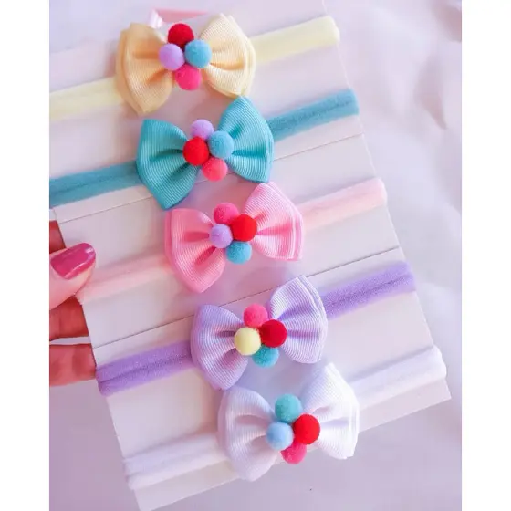 Kit 5 Faixinhas com Laço e Pompom Colorido – Acessórios para Bebê Delicado