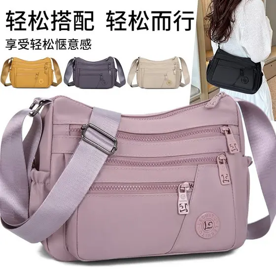 Bolsa mensageiro de pano Oxford feminina 2026 novo estilo primavera bolsa feminina de meia-idade grande capacidade de vi