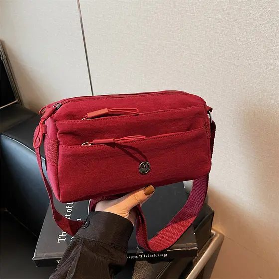 2025 Outono Novo Estilo Oxford Pano Commuter All-Match Messenger Bag Bolsa Feminina Pequena Bolsa Quadrada Multicamadas