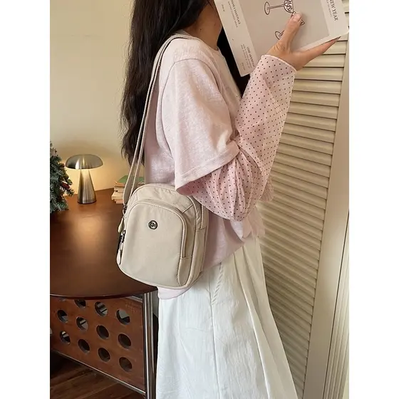 Japonês simples lona mensageiro pequeno saco de pano feminino 2026 novo estilo Multi-camada zíper Casual All-Match leve 