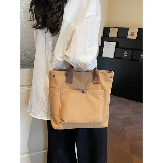 Simples grande capacidade sacola feminina bolsa de lona All-Match Commuter bolsa de ombro moda 2026 novo estilo na moda