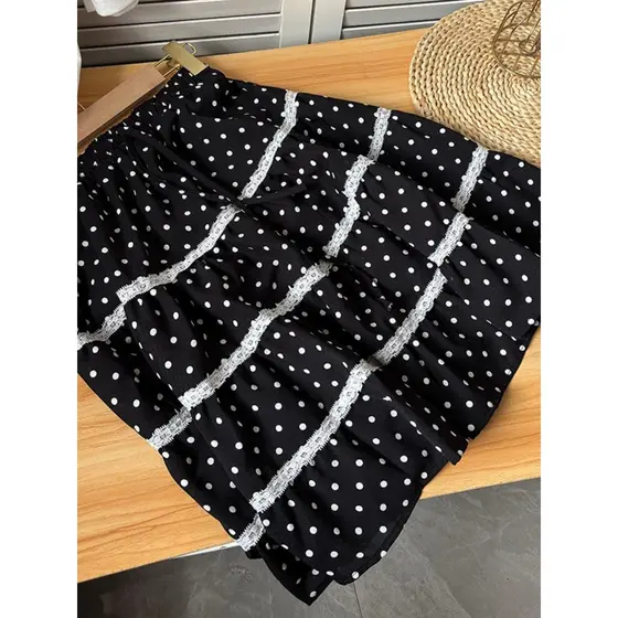 Coreano Casual All-Match Polka Dot renda costura saia feminina verão 2026 novo estilo preto meados de comprimento bolo s