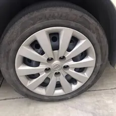 Adequado para 53cm clássico novo Sylphy puro veículo elétrico hub capa nova azul pássaro hub capa nova Tiida pneu capa