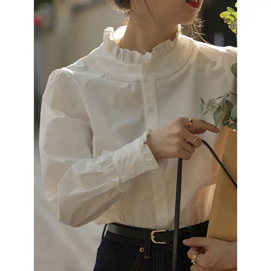 Camisa de gola de renda branca feminina início da primavera 2026 novo estilo Design camisa pequena estilo francês interi