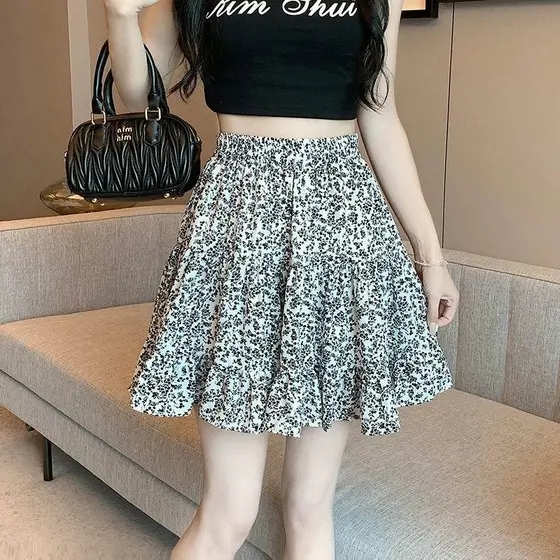 Saia Floral feminina 2026 verão novo estilo cintura alta mais magro olhar A linha saia Casual grande balanço cintura elá