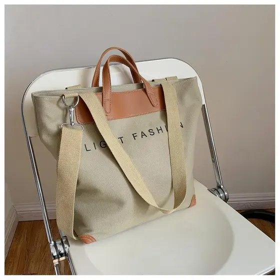 2026 novo estilo portátil grande saco de lona grande capacidade feminino estilo coreano Retro sacola saco de viagem