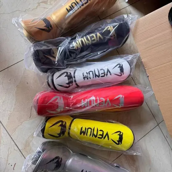 Muay thai Leggings muay thai luta caneleiras com pé engrossado treinamento competição equipamentos de proteção pé guarda