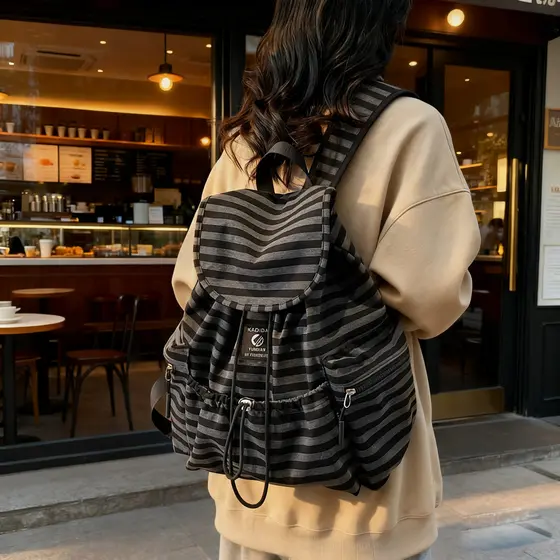 Nova mochila listrada para mulheres, casual e estilosa, versátil, estilo coreano, grande capacidade.   ZSRD