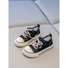 2026 primavera novo estilo crianças sapatos de lona manga Toe meninos sapatos meninas tênis de cano baixo sapatos de pan