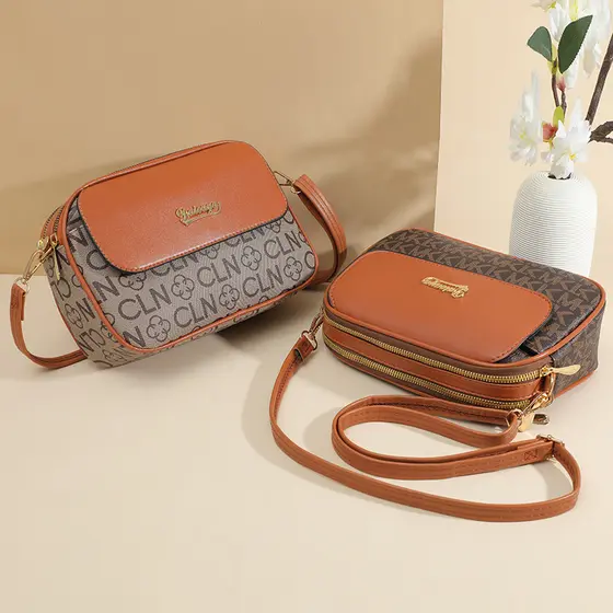 Bolsa feminina 2026 novo estilo bolsa mensageiro All-Match impresso meia-idade idosos bolsa de moedas do telefone móvel