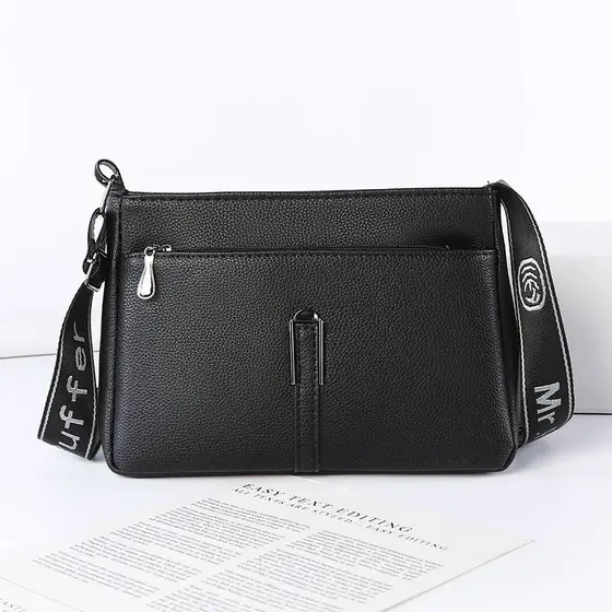 Nova bolsa feminina bolsa mensageiro moda All-Match mãe de meia-idade bolsa de ombro couro macio grande-boné
