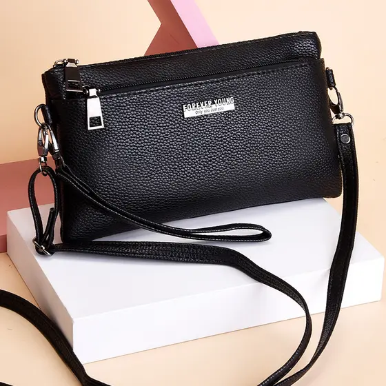 Bolsa mensageiro pequena para celular feminina 2026 novo estilo bolsa feminina de meia-idade bolsa mãe bolsa de moedas c