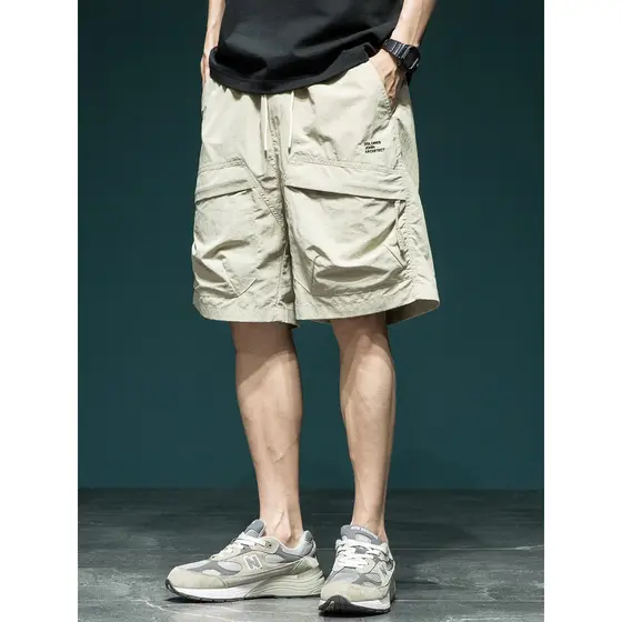 Americano Casual grande bolso Shorts de secagem rápida masculino solto tamanho grande ao ar livre série montanha estilo