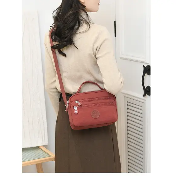 Portátil mensageiro pequeno saco feminino náilon Oxford pano repelente de água Multi-bolso simples All-Match lazer viage