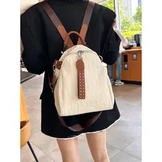 Trabalhador de escritório mochila feminina High-End sentimento 2023 nova carta em relevo Casual Commuter estudante unive