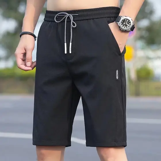 Calças de pijama masculinas verão Shorts de seda gelo Casual calças grandes soltas calças de cinco pontos verão Plus Siz