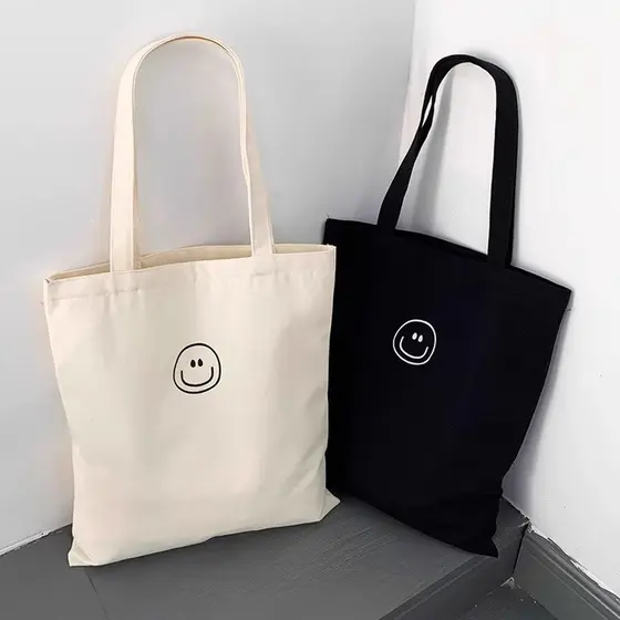 Bonito rosto sorridente simples estilo japonês All-Match bolsa de lona masculino feminino estudantes universitários clas