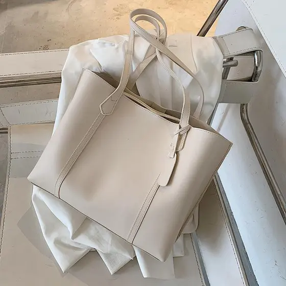Nicho Design sacola de couro macio de grande capacidade bolsa feminina de um ombro nas axilas High-End sentido criança-m