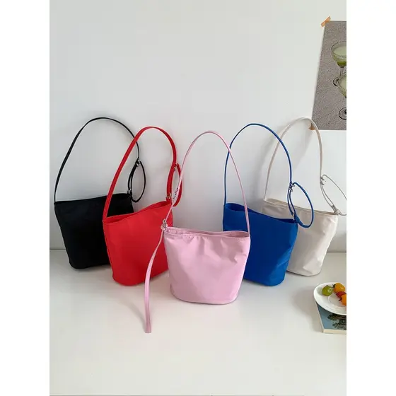 DAMEBB2026 Retro All-Match Leve Nylon Portátil Balde Bolsa Versão Coreana Simples Casual Ombro Axila Bolsa