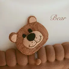 Urso artesanal bonito dos desenhos animados bolsa de moedas versão coreana estudante lã feltro fone de ouvido saco de ar