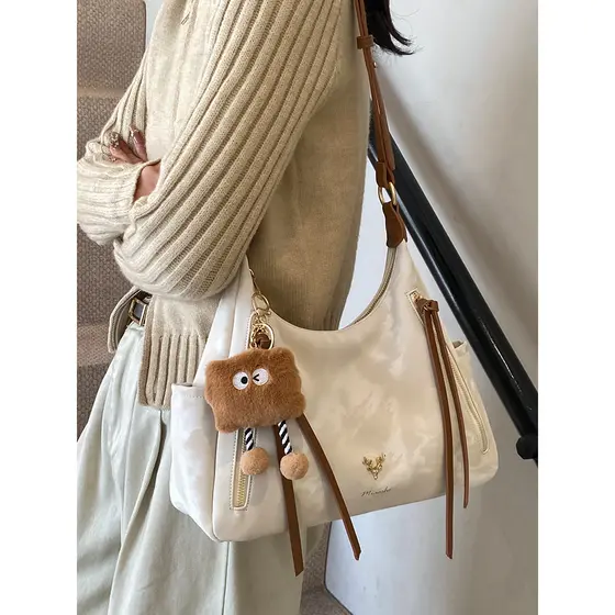 Hong Kong IT HKins nicho Design Crossbody ombro bolsa feminina 2026 novo estilo Commuter saco feminino Retro axilas saco