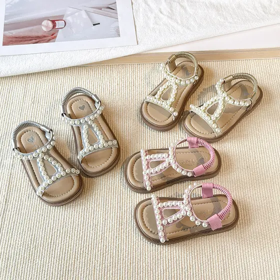 2026 verão novo estilo meninas sandálias de praia romanas meninas All-Match estilo fada pérola sapatos de princesa