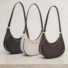 Bolsa feminina meia lua de ombro media minimalista moderna e elegante corrente dourada para o dia a dia