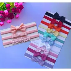 Kit com 10 + kit de 3 faixinhas Salmao de laços para bebê RN.
