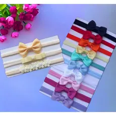 Kit com 10 + kit de 3 faixinhas Amarelo de laços para bebê RN.