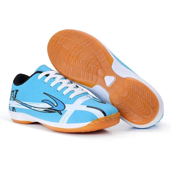 Chuteira de Futsal unissex.